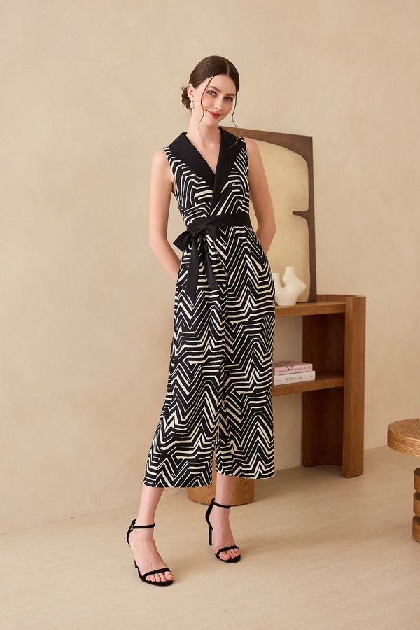 Nikita Romper In Black Prints