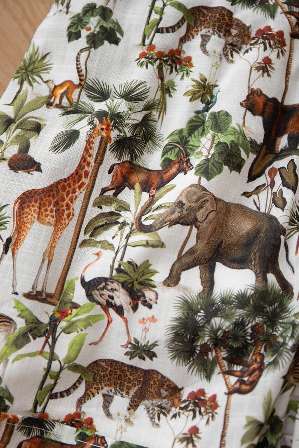 Isaiah Romper In Safari Prints