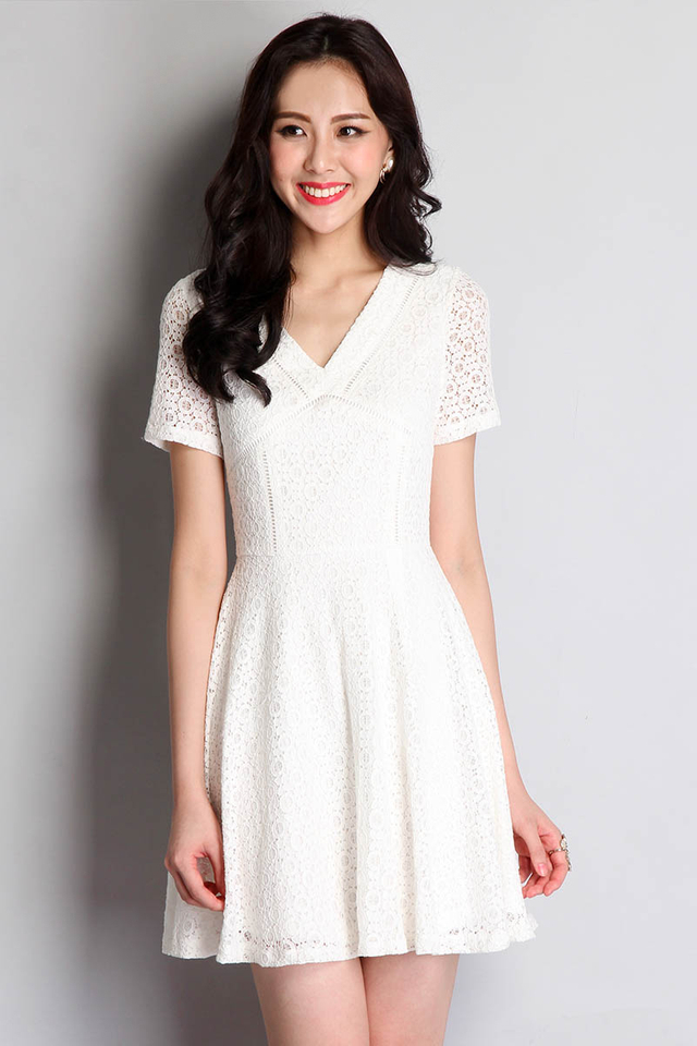 An Innocent Waltz Dress In White Lace
